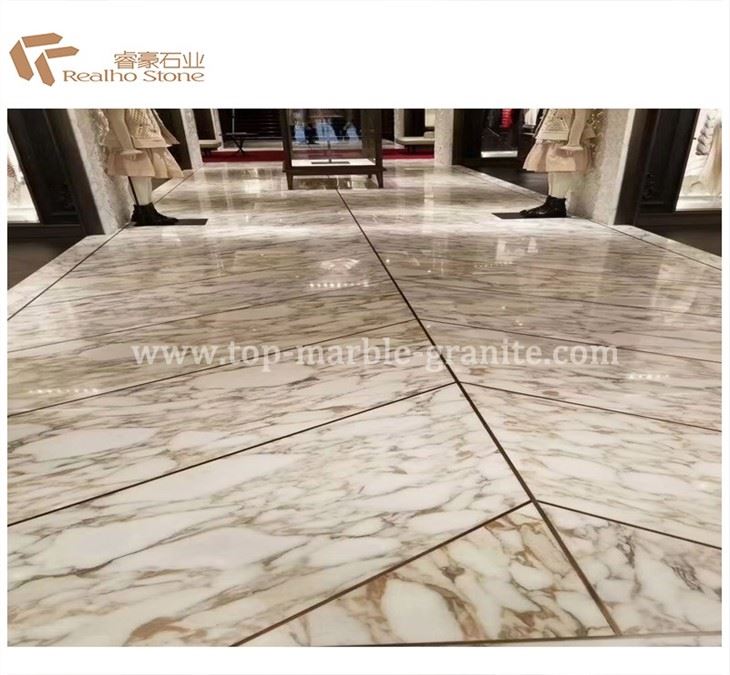 calacatta gold floor tile